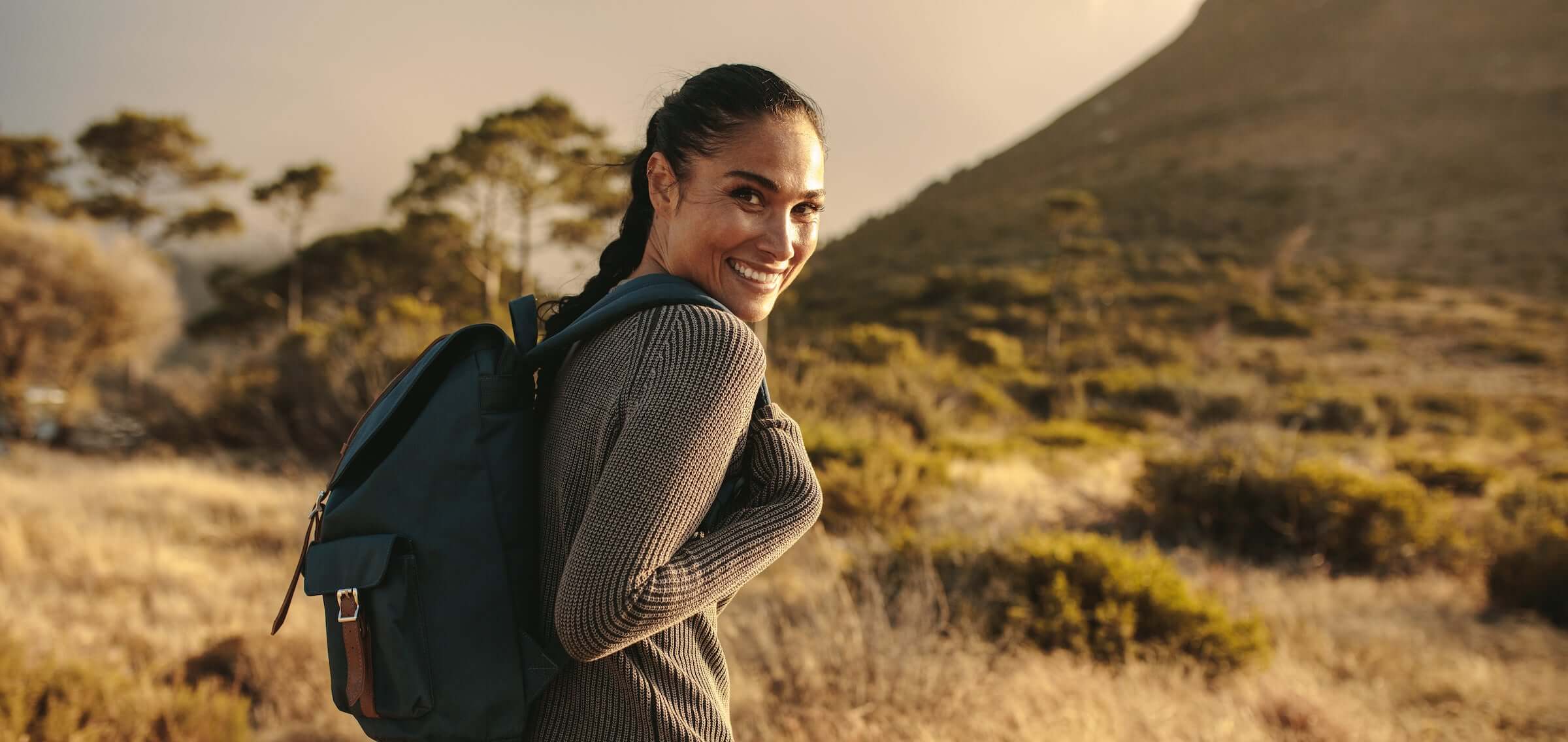a woman walking in nature